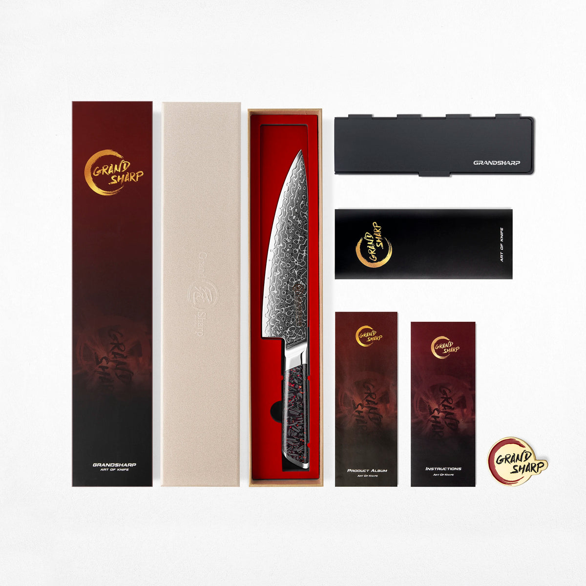 Damascus chef knife with red and black handle in luxury gift box with GrandSharp branding and accessories