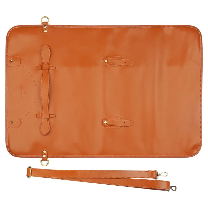 Tan leather knife roll with straps and metal hardware, ideal for kitchen knife storage and transport