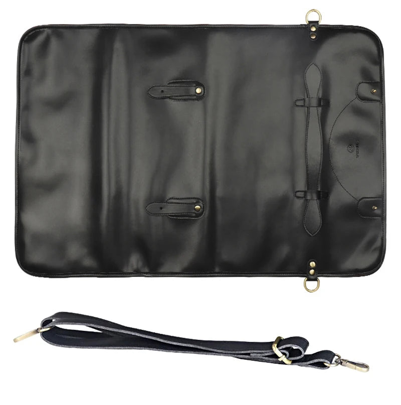 Black leather knife roll with straps and carry handle for kitchen knife storage and transport